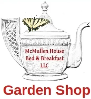 McMullen Teapot logo with swallowtail for accessibility page.